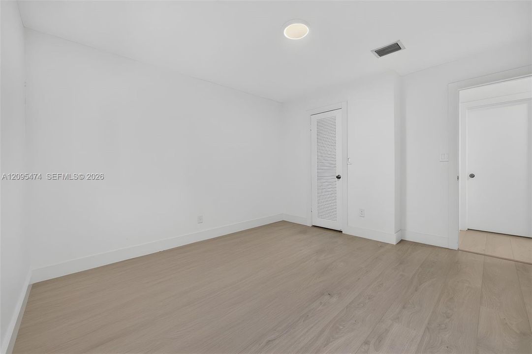 AND 2ND WALK-IN CLOSET.Digitally decluttered using AI.