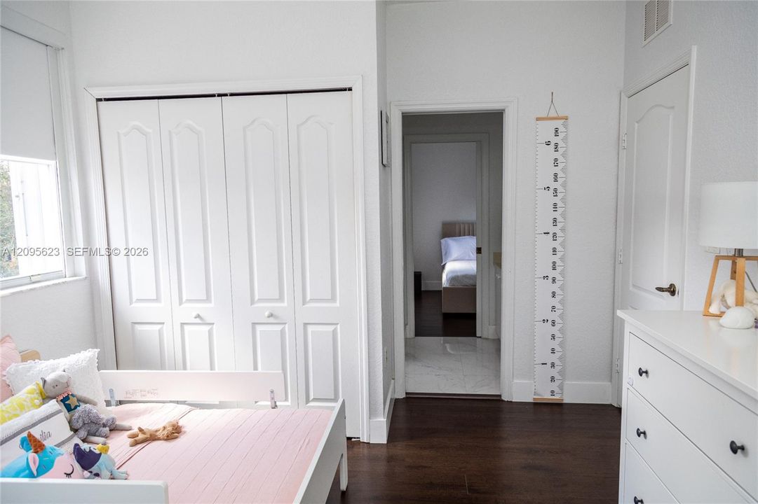 Bedroom 2. conveniently  located near the staircase  on the second floor , offering  easy access and a functional layout