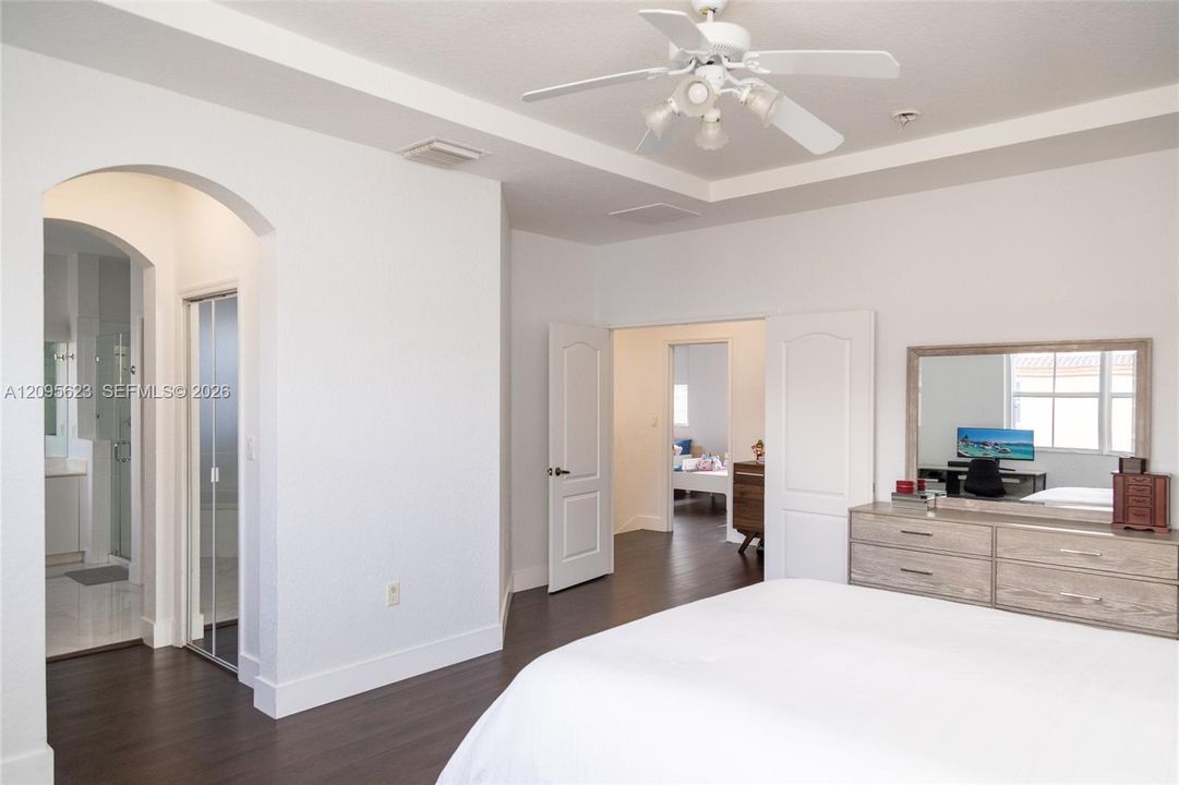 Spacious primary bedroom,  offering conform and privacy with a well- designed layout.