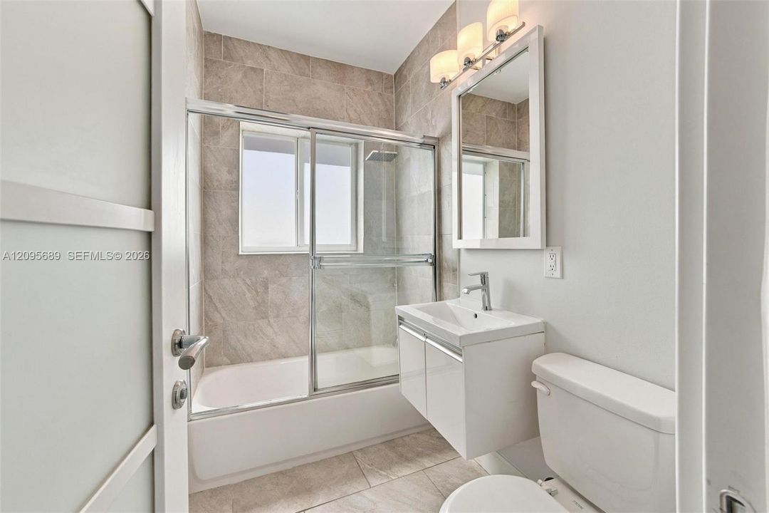 Shared bathroom between 2nd & 3rd bedroom