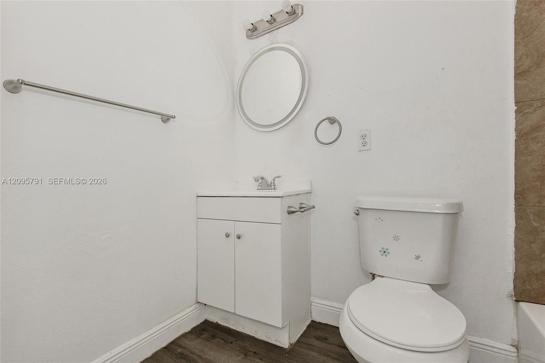 The bathroom just off the living room and outside of the bedroom.  It's convenient for guests to use it without having to go into the bedroom.