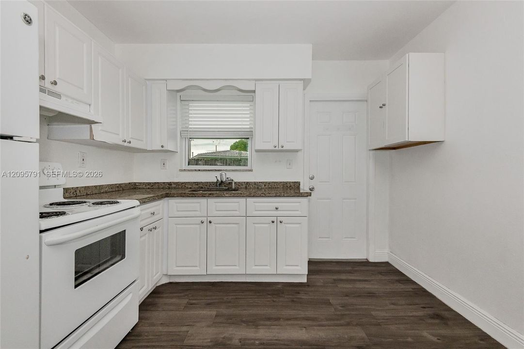 The kitchen has space to make it an eat-in kitchen along the right wall.