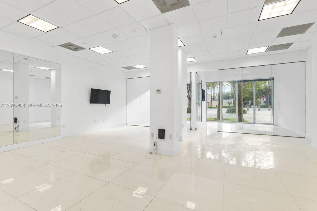 Main open area with column, storefront beyond