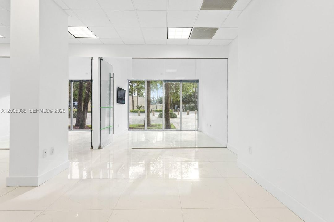 View toward glass-walled front room