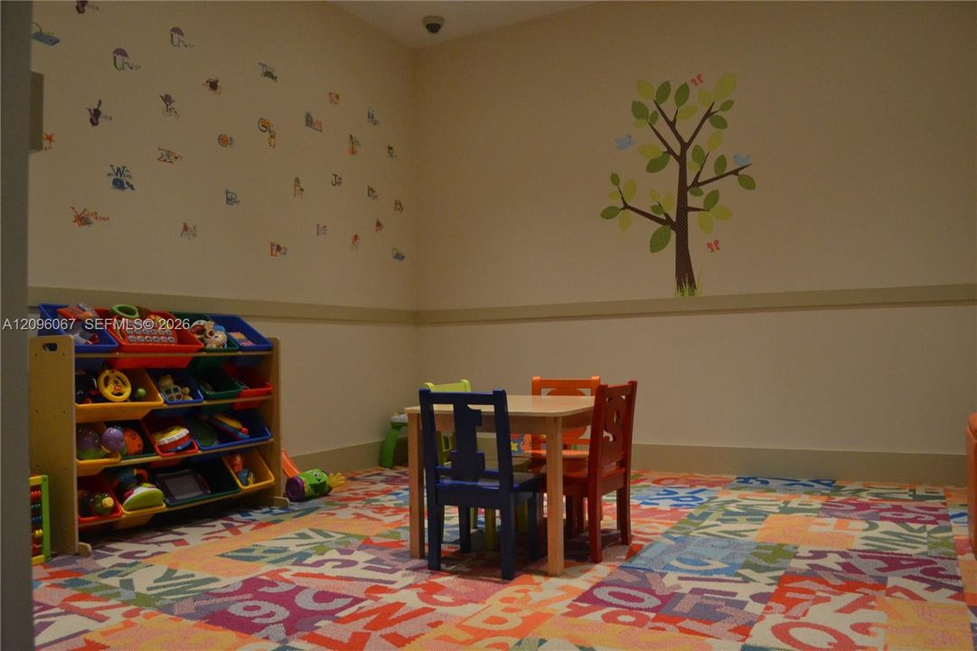 Wall-to-wall alphabet patterned carpeting