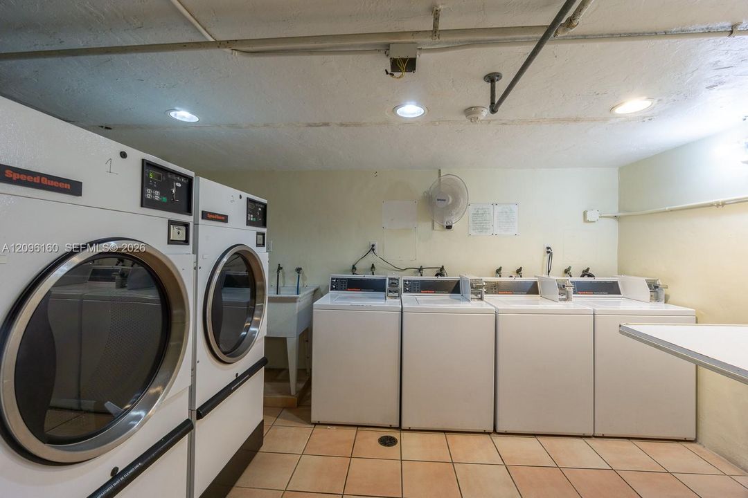1 of 2 laundry rooms; commercial gas dryers