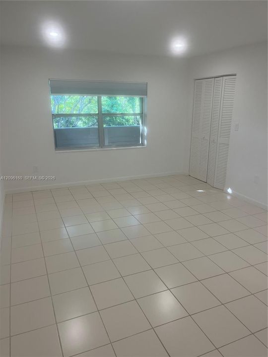 Primary bedroom with 3 closedts