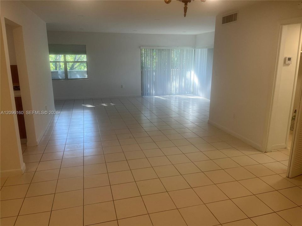 Huge Living Room with Slider to Wrap-Around Balcony