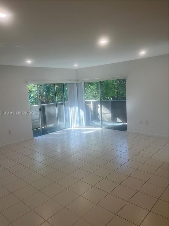 Huge Totally tiled Living Room Area