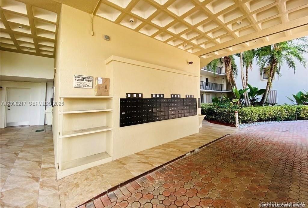 COVERED ENTRANCE TO BUILDING