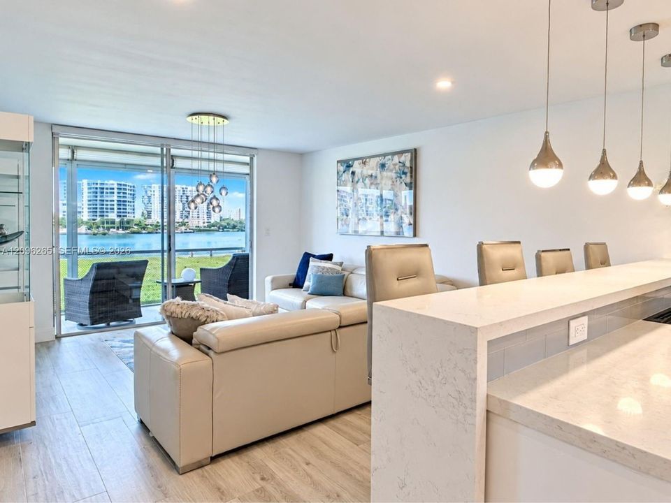 Sleek updated kitchen with modern cabinetry, stainless steel appliances, and ample counter space.