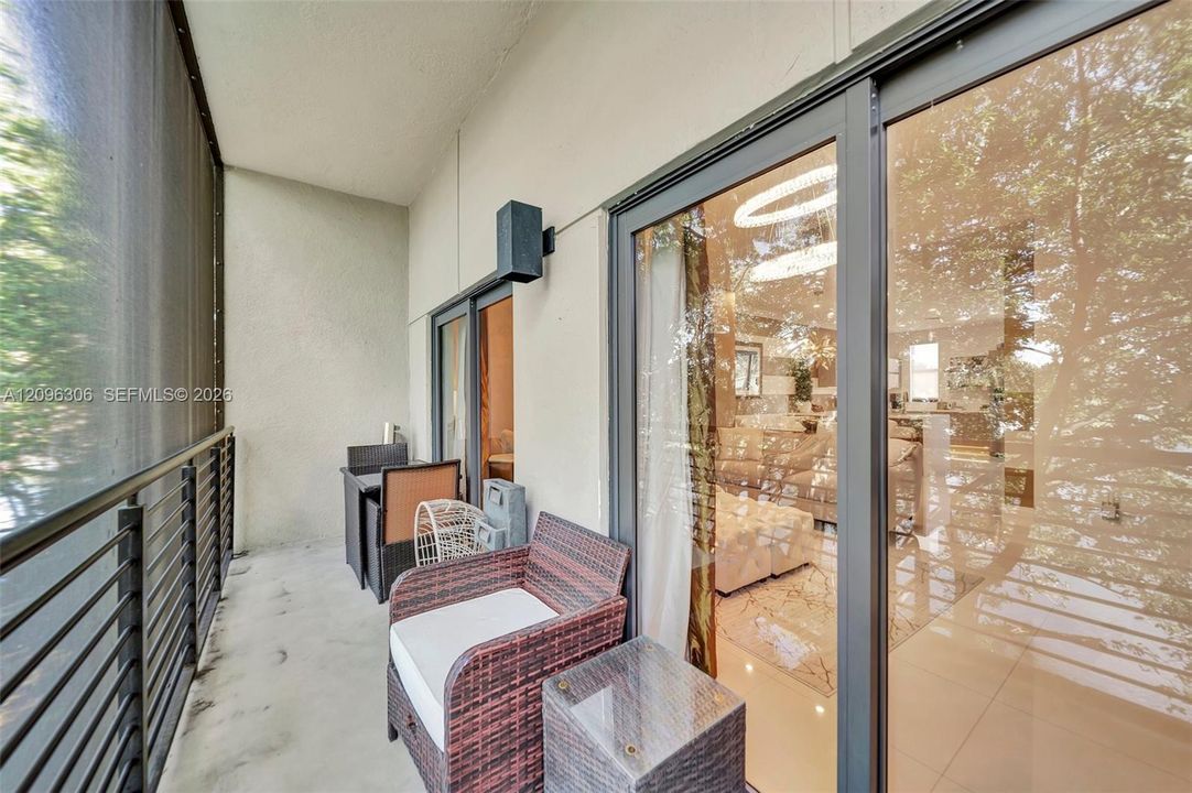 Morning coffee  or alfresco dining on your covered/screened balcony