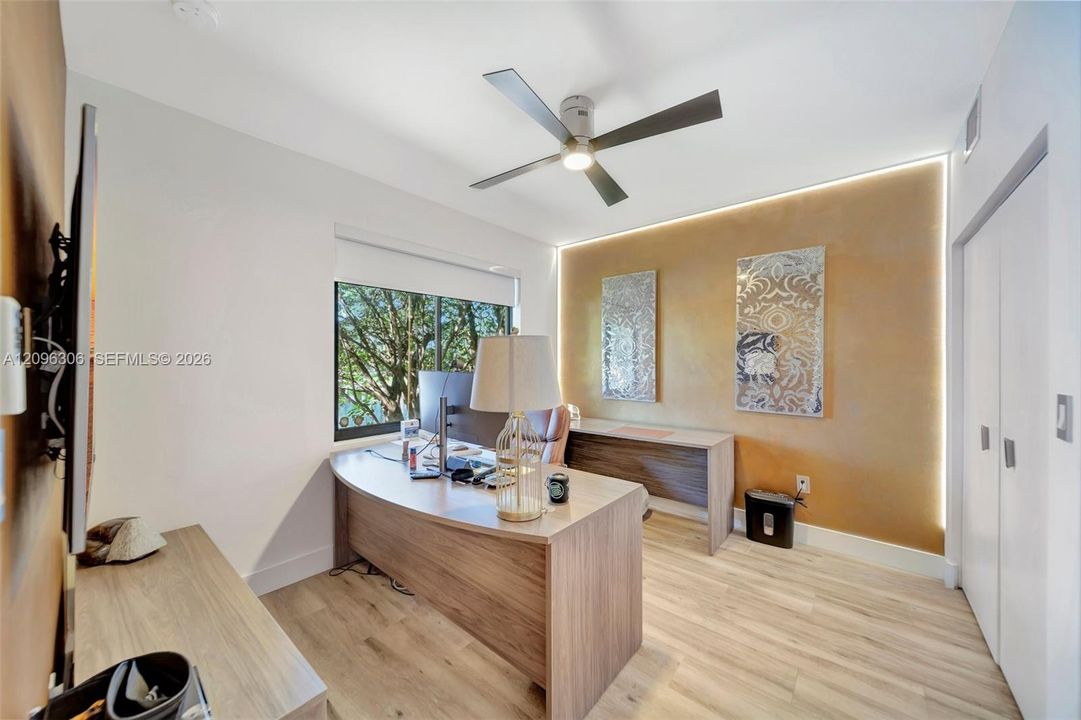 First Floor guest bedroom currently used as an office with custom lighting