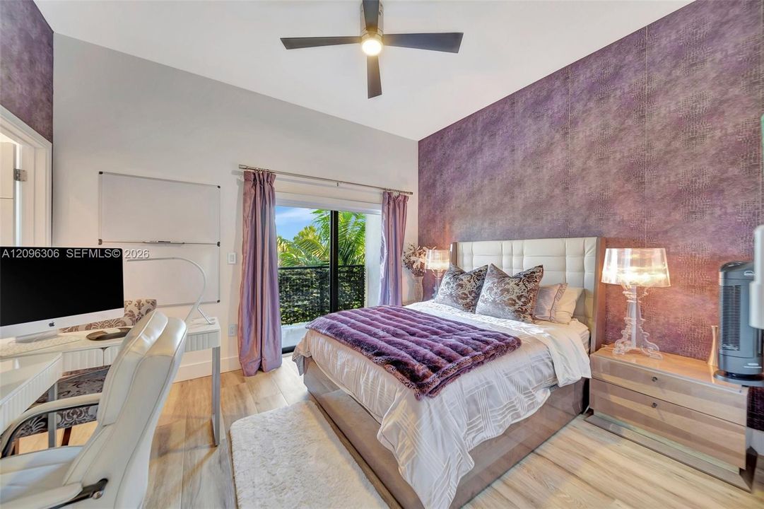 2nd floor guest bedroom with private balcony