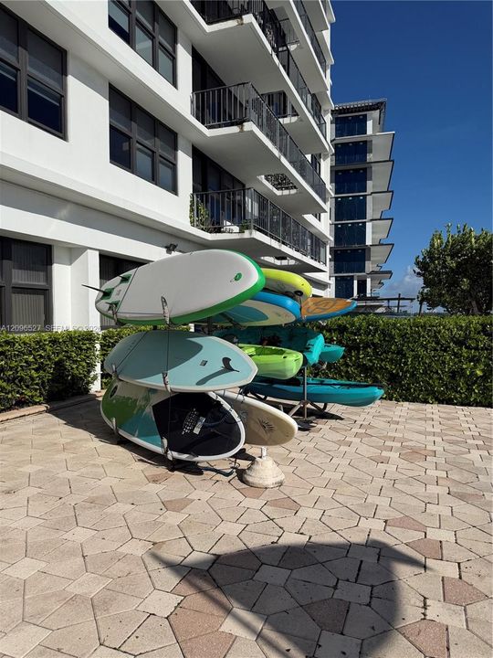 Paddle/kayak storage with a launch area