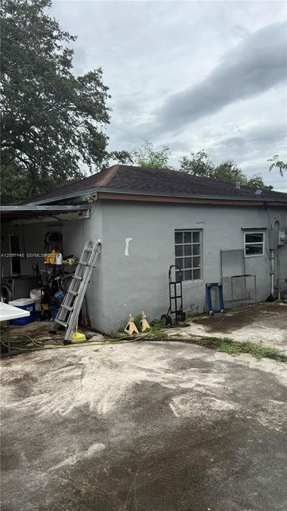 Rear exterior and carport area