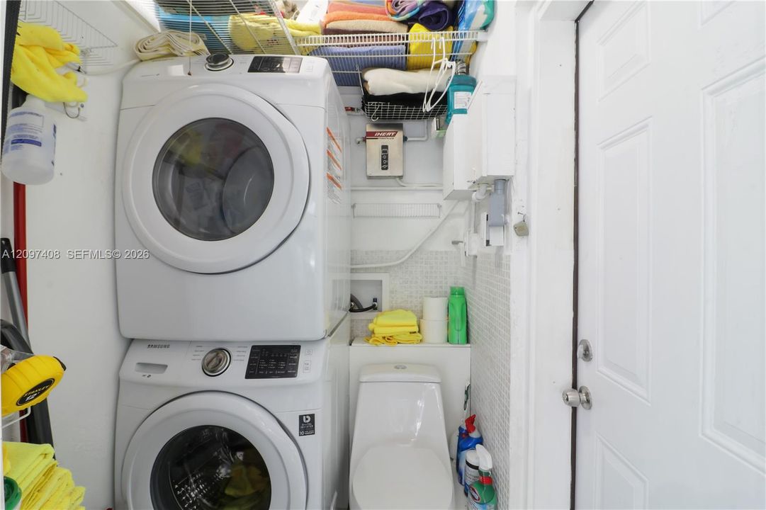 Laundry w/ 1/2 bth located in Primary Bdr