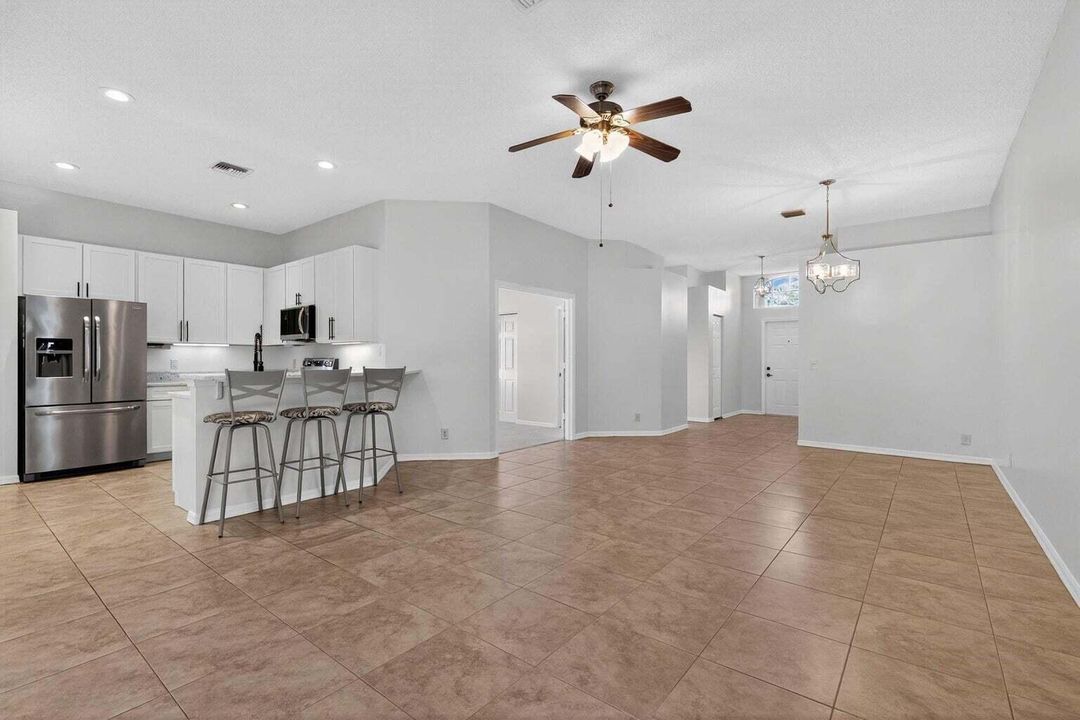 7280 SE Magellan great room:kitchen