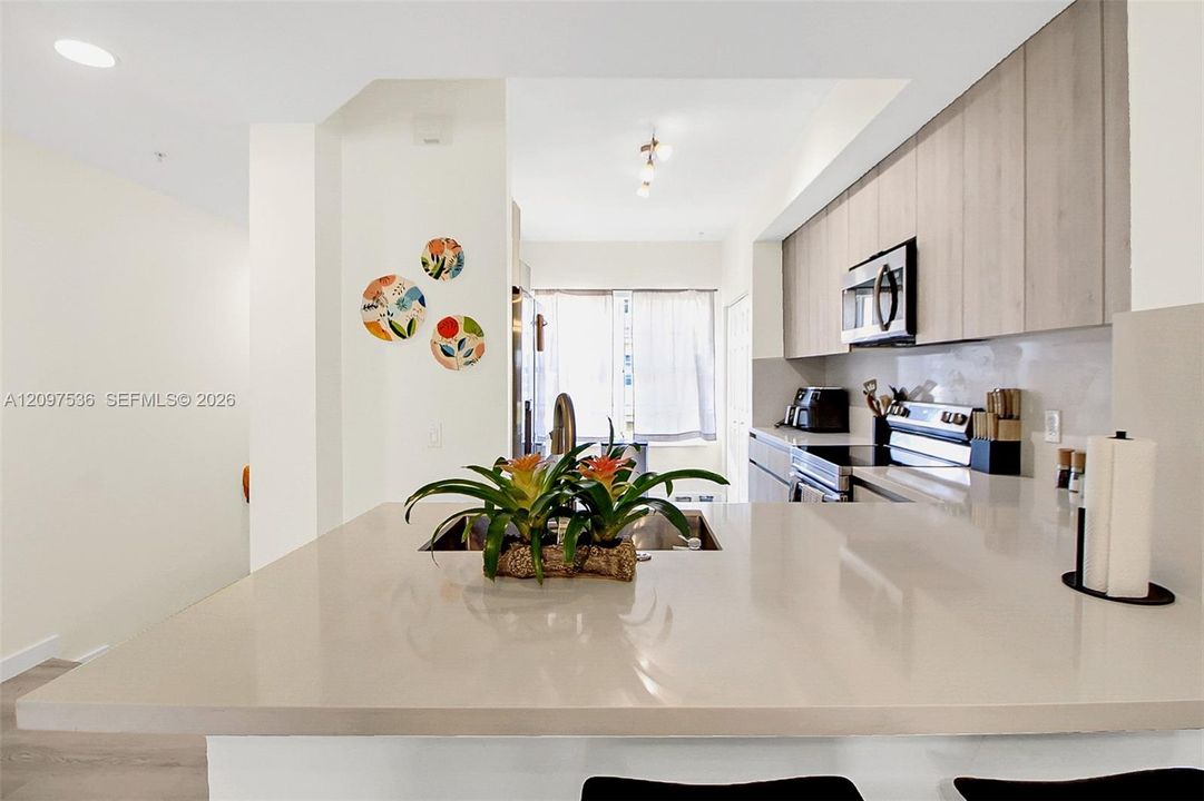 Open counter connect everyone to living and dining areas