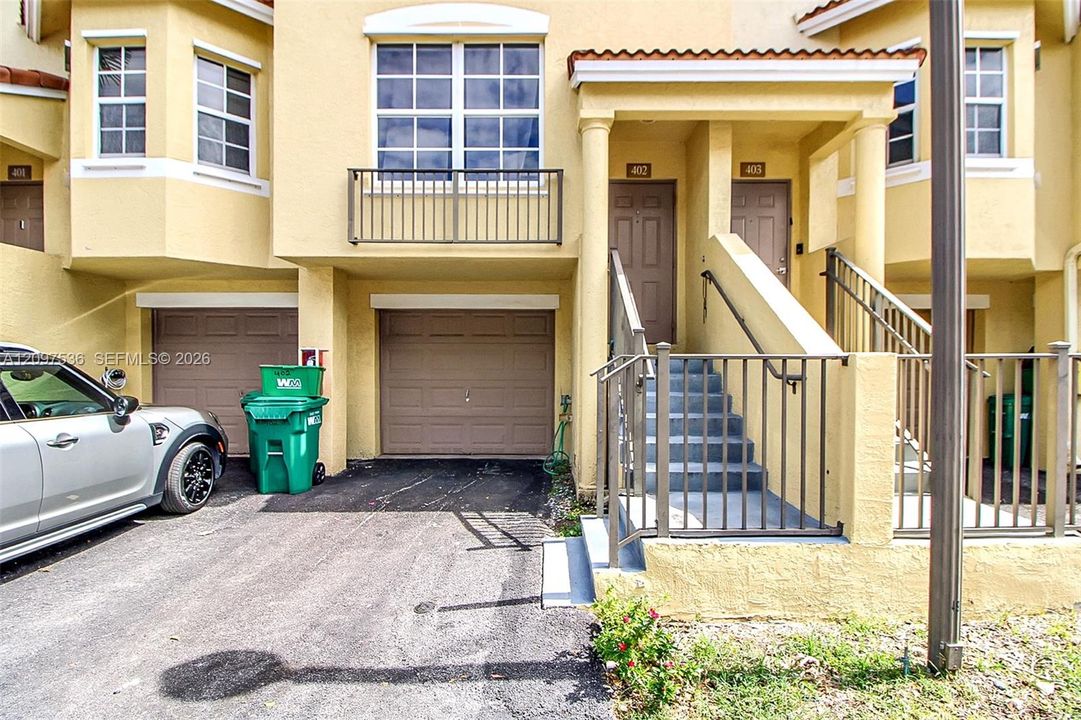 Additional dedicated parking space in front of your unit in addition to the 2 spaces in the garage.