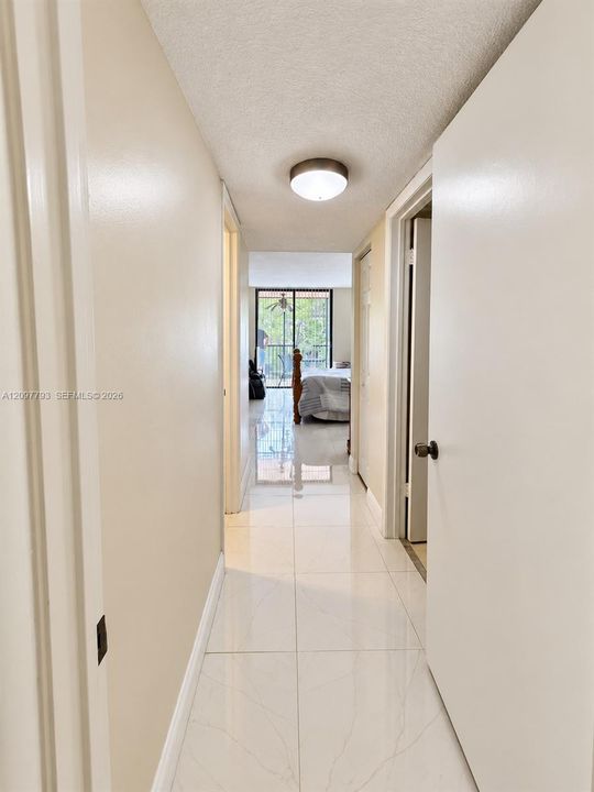 To bedroom, closet left&bathroom right