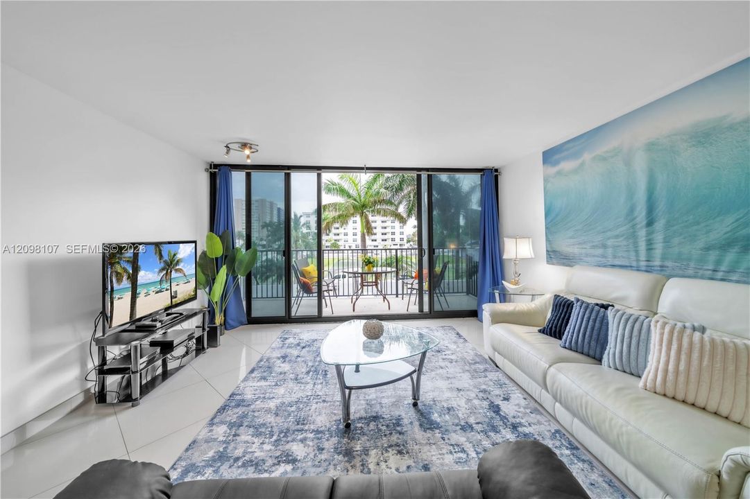 Bright living room with floor-to-ceiling glas