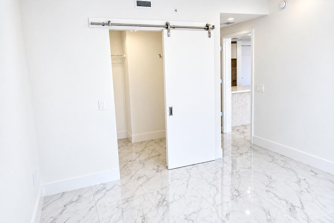 Bright Minimalist Room with Barn Door