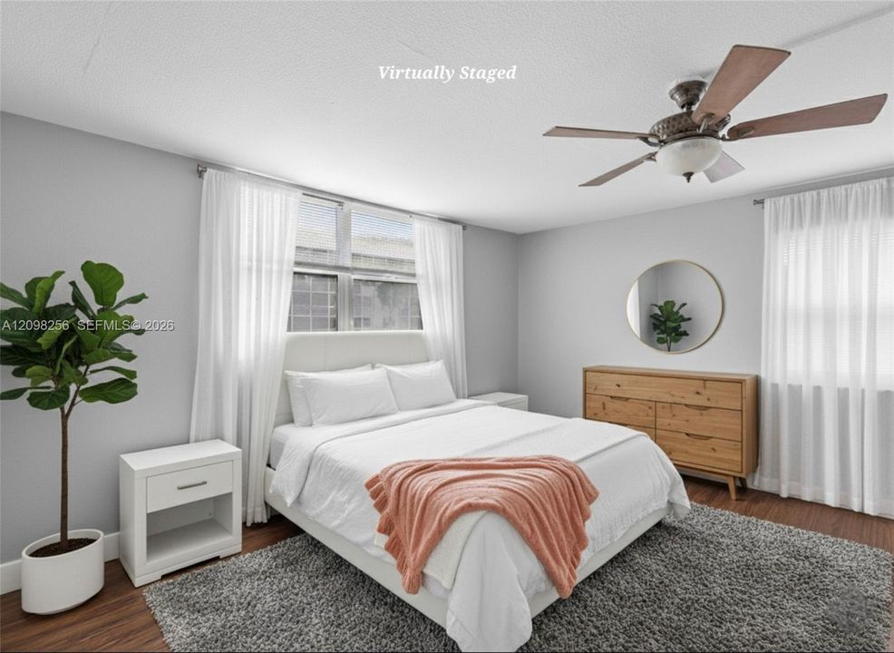 Primary, virtually staged. This furniture is not included.