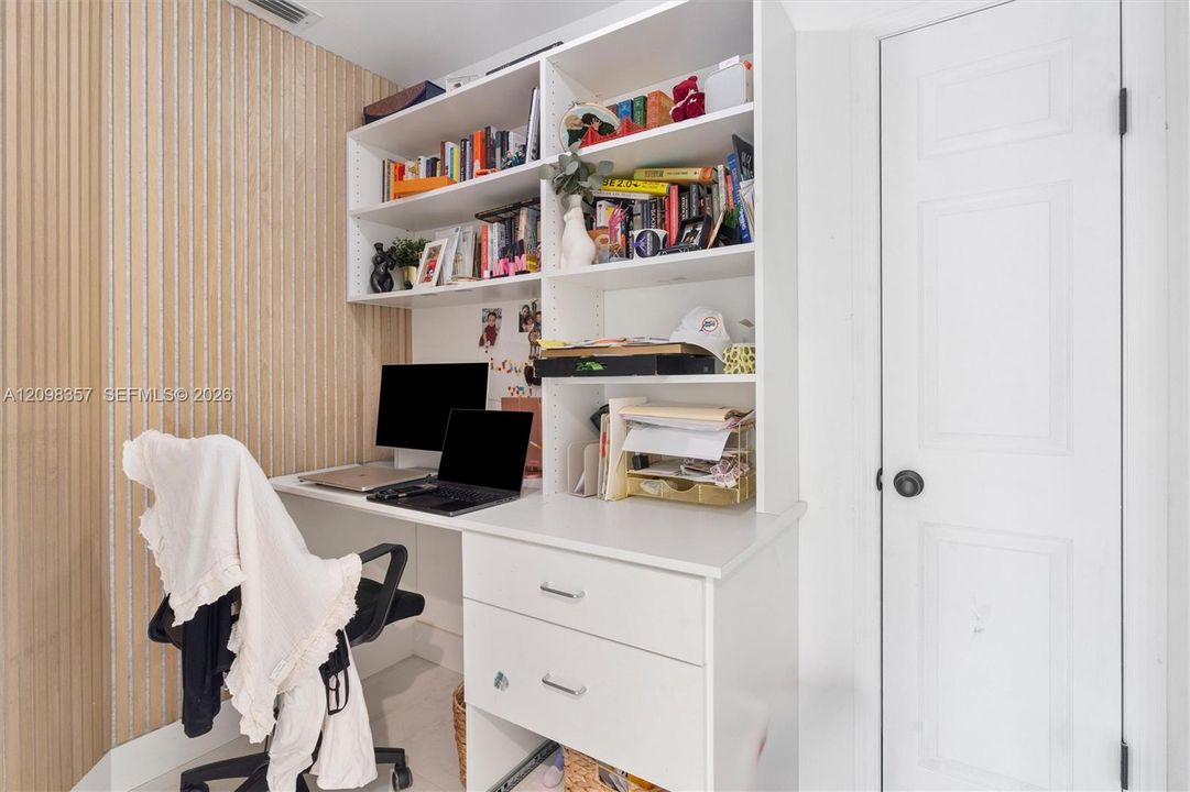 Additional Den Space Converted to an office with premium built ins-