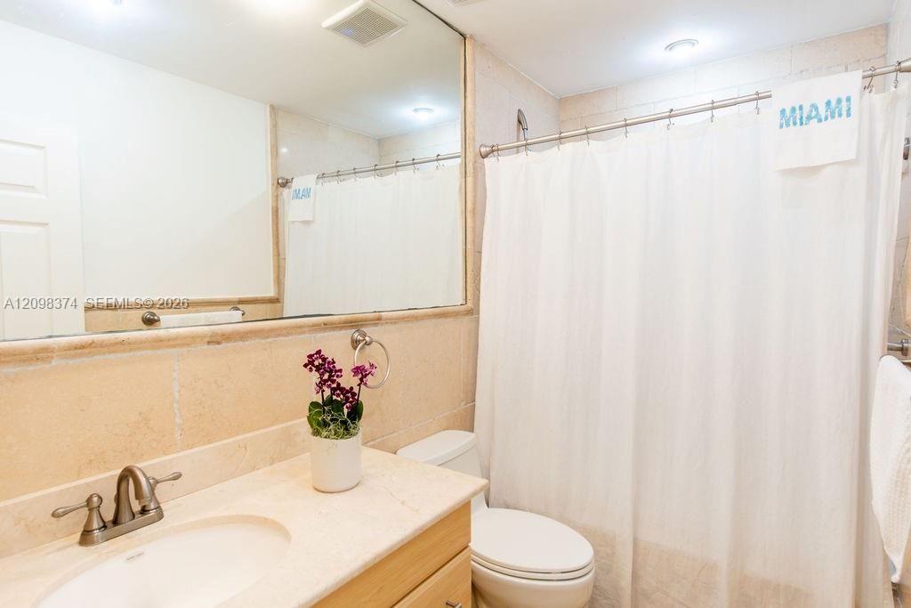 Bathroom # 2 with jacuzzi-shower combination.