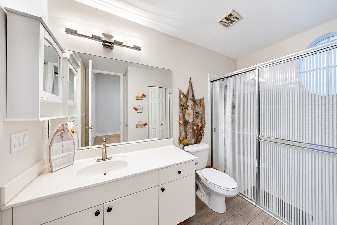Bright Coastal Bathroom with Nautical Ac