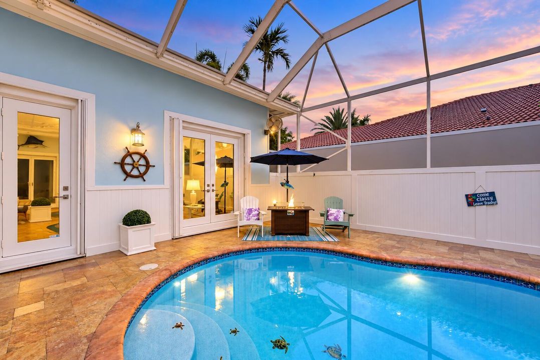 Twilight Screened Poolside Retreat