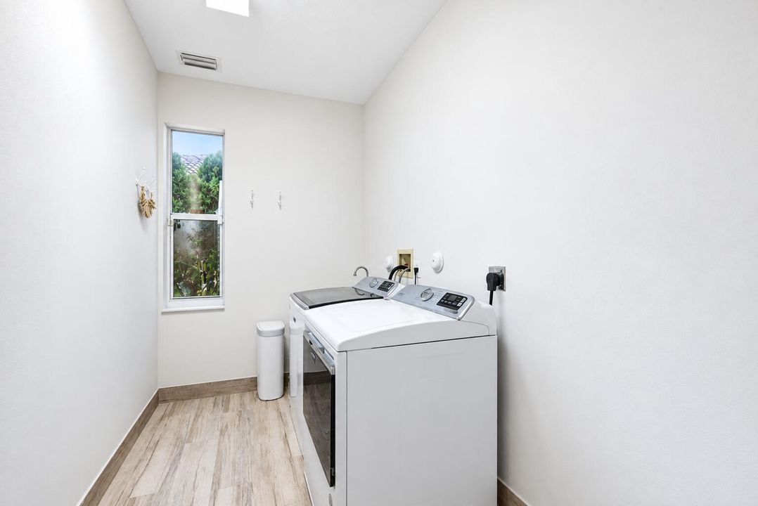 Bright Minimalist Laundry Room
