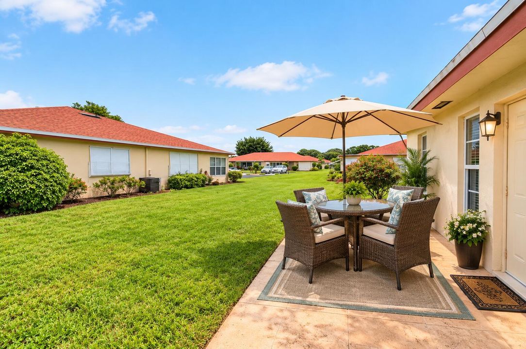 AI added patio furniture on backyard pat