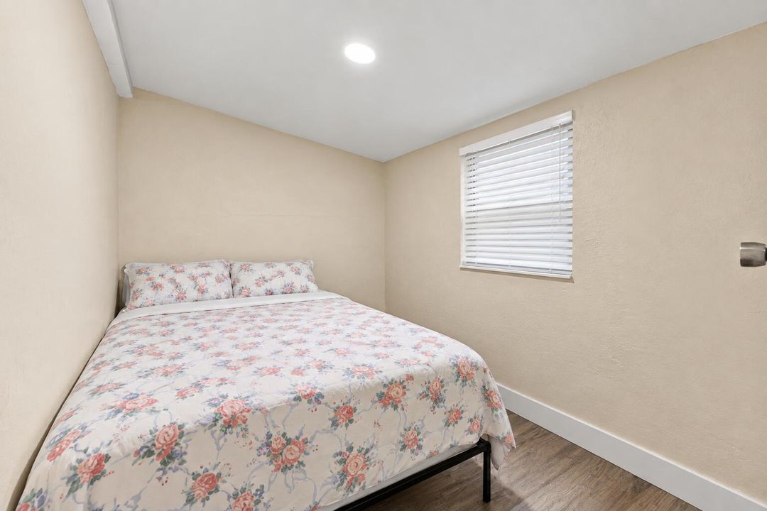 Minimal Floral Bedroom with Window Blind