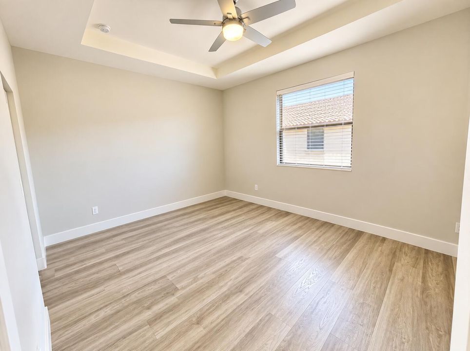 Large primary suite with tray ceilings