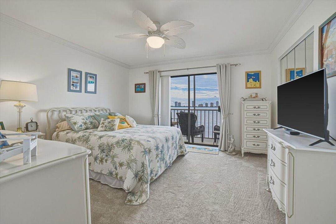 Bedroom with sliders out to balcony