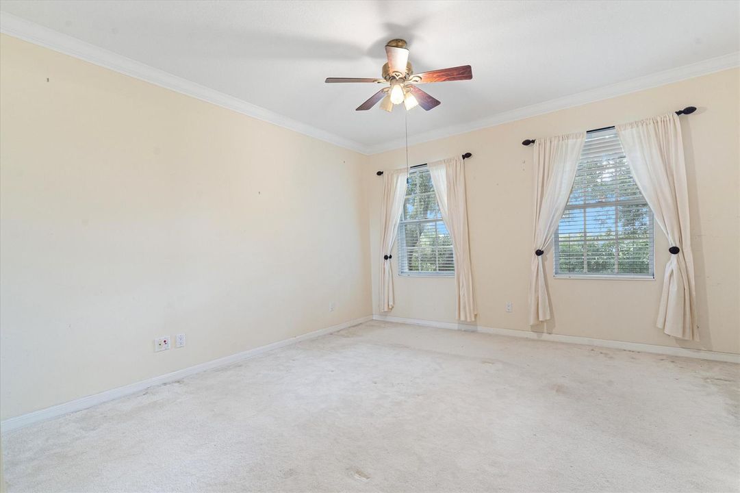 Golf course view master bedroom