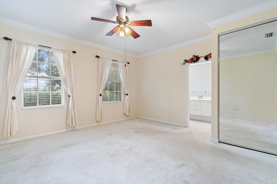 Golf course view master bedroom