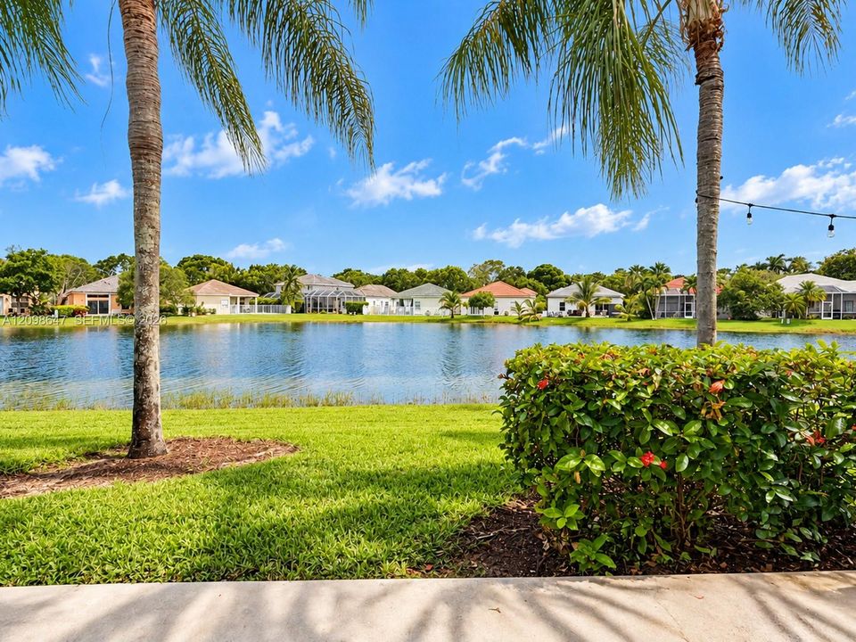 Tranquil lake view backing directly to the property line with beautiful water views.