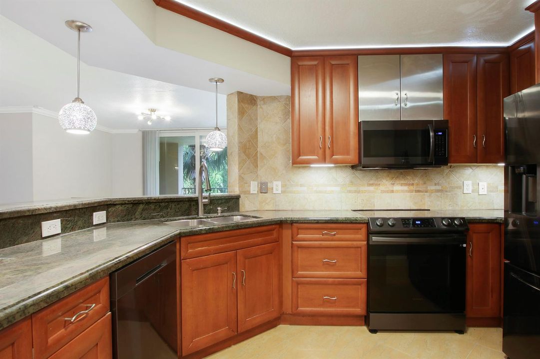 Kitchen looking to Living Rm