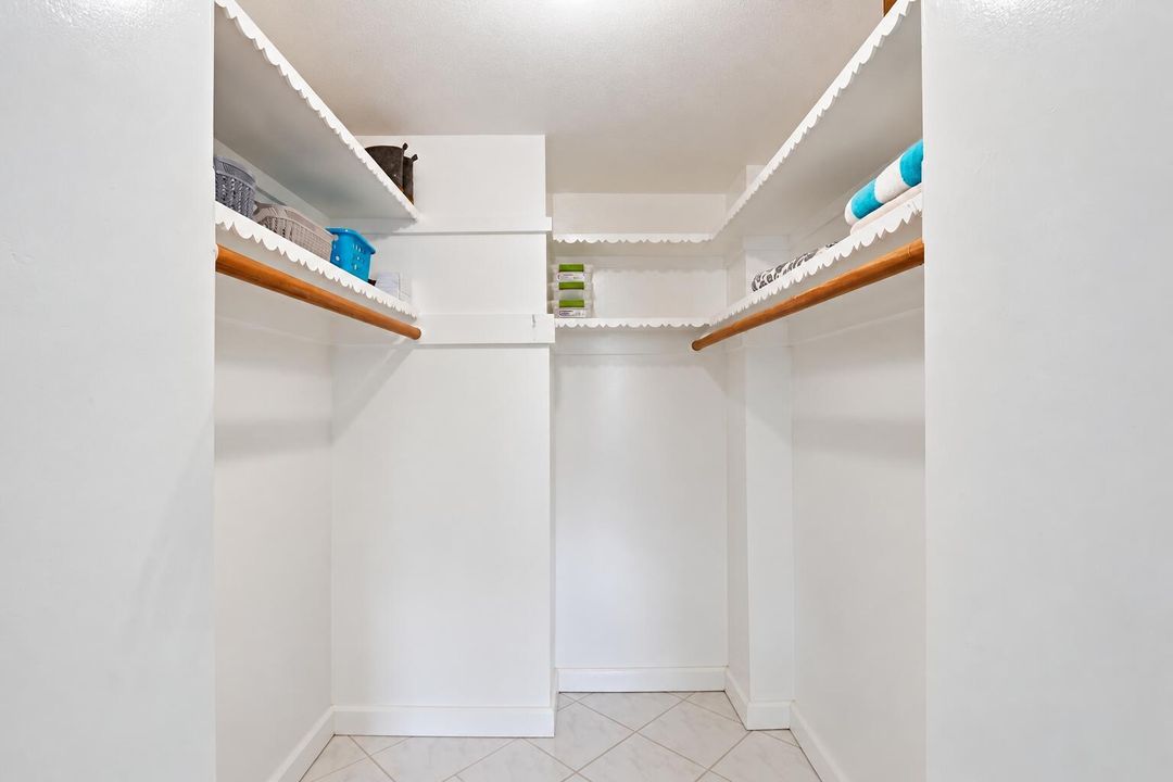 Empty Bright Walk-In Closet