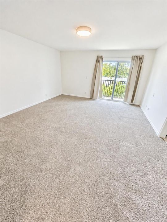 Bright Minimalist Room with Balcony View
