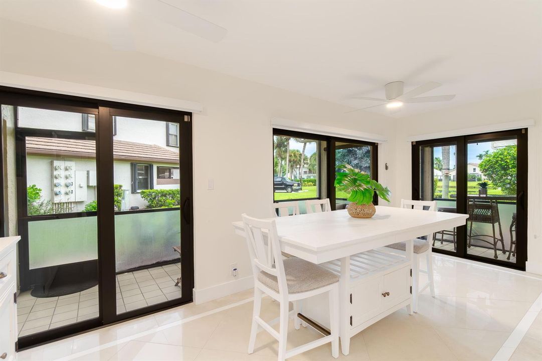 Dining Area Overlooking Screened Patios