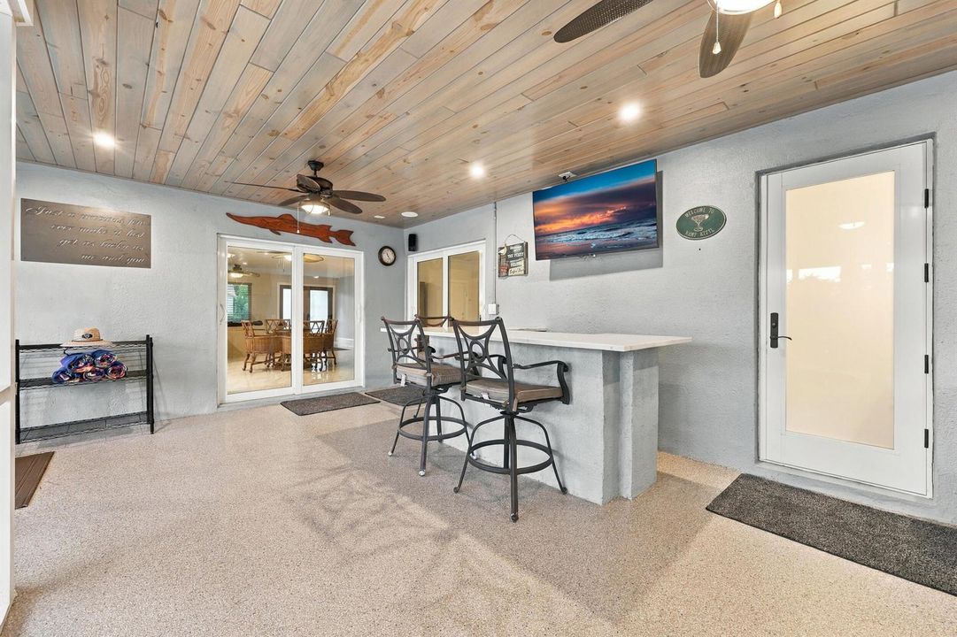 Nearly 900sqft covered & screened patio