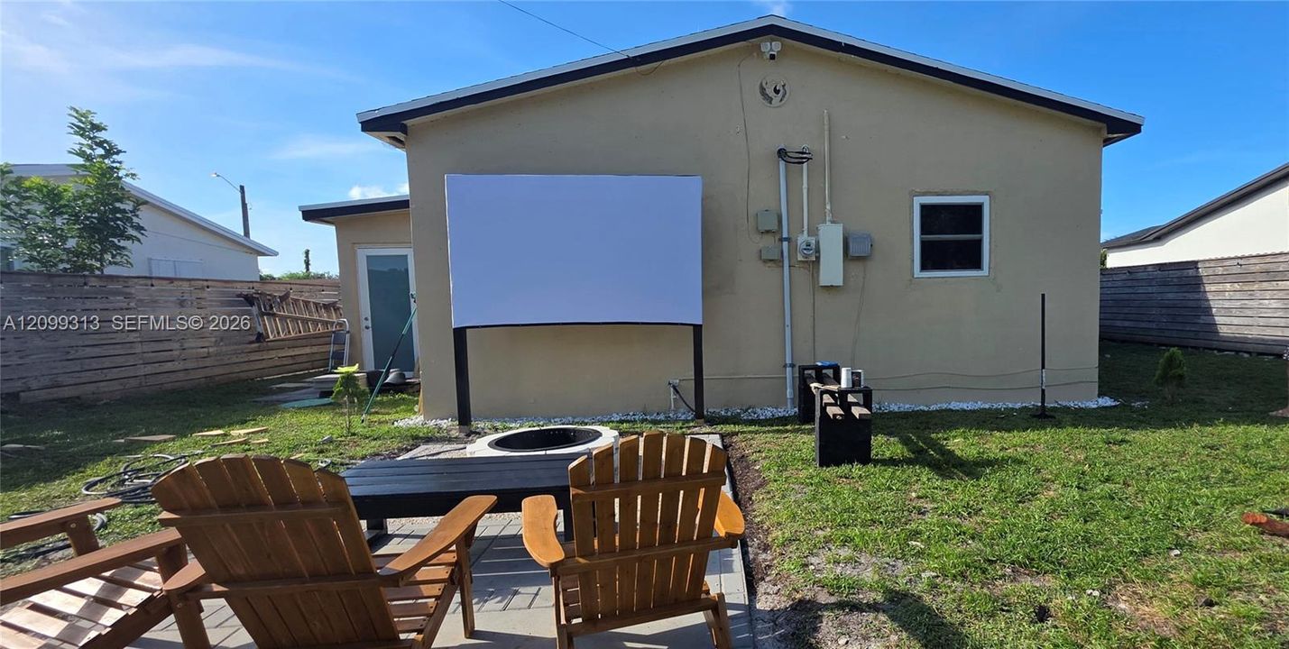 Fire pit and Movie projector.