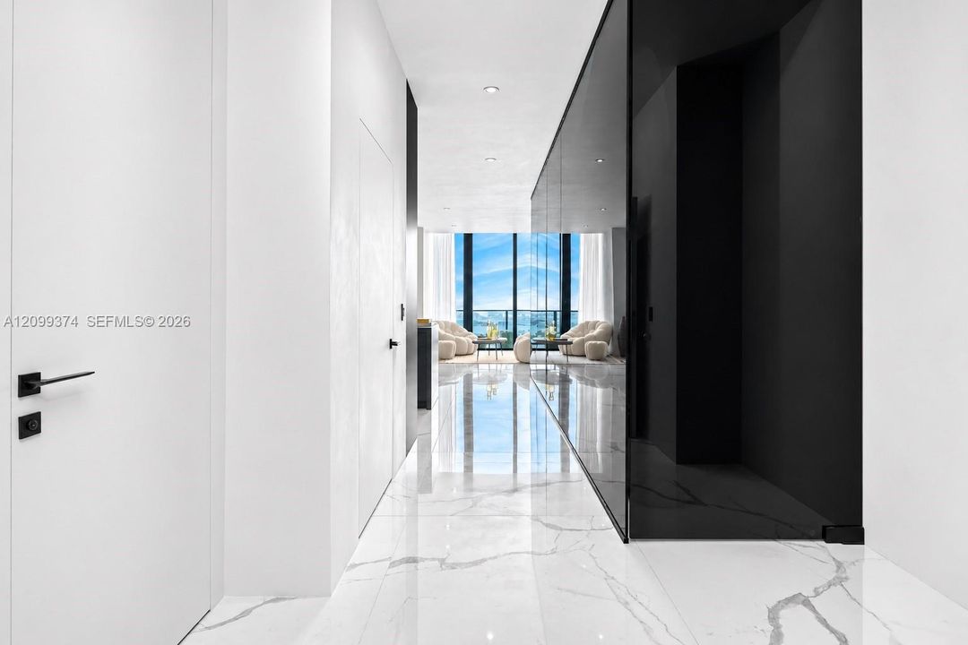 Interior hallway with seamless doors and refined finishes