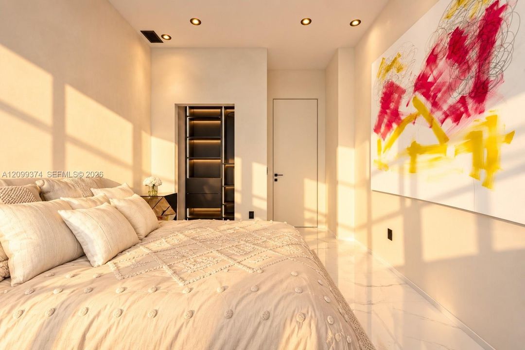 Bedroom illuminated by warm golden-hour light