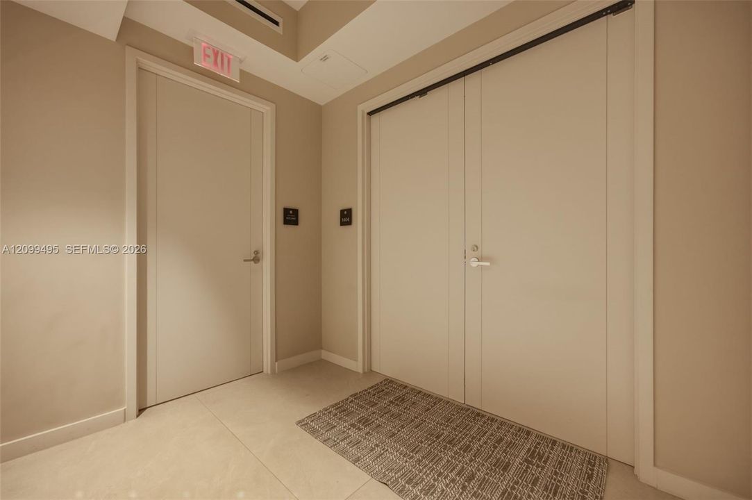 Large and beautiful living area. The high ceiling, Italian flooring, modern warm lighting and the motorized curtains makes this space contemporary, elegant and sophisticated.