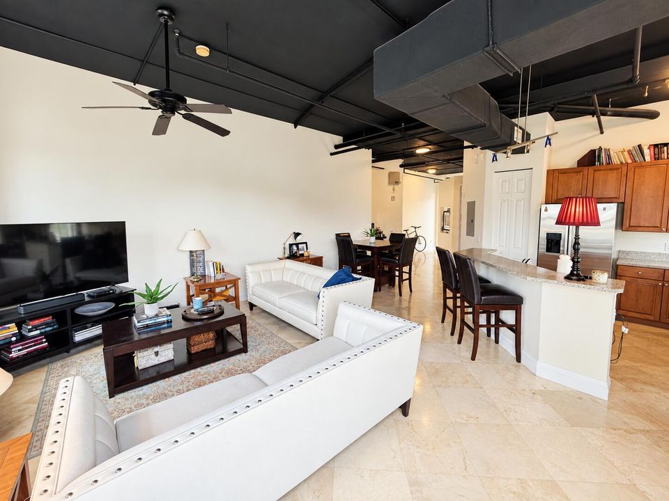 Bright, inviting kitchen with black ceil